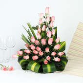 A tall arrangement of 30 Pink roses